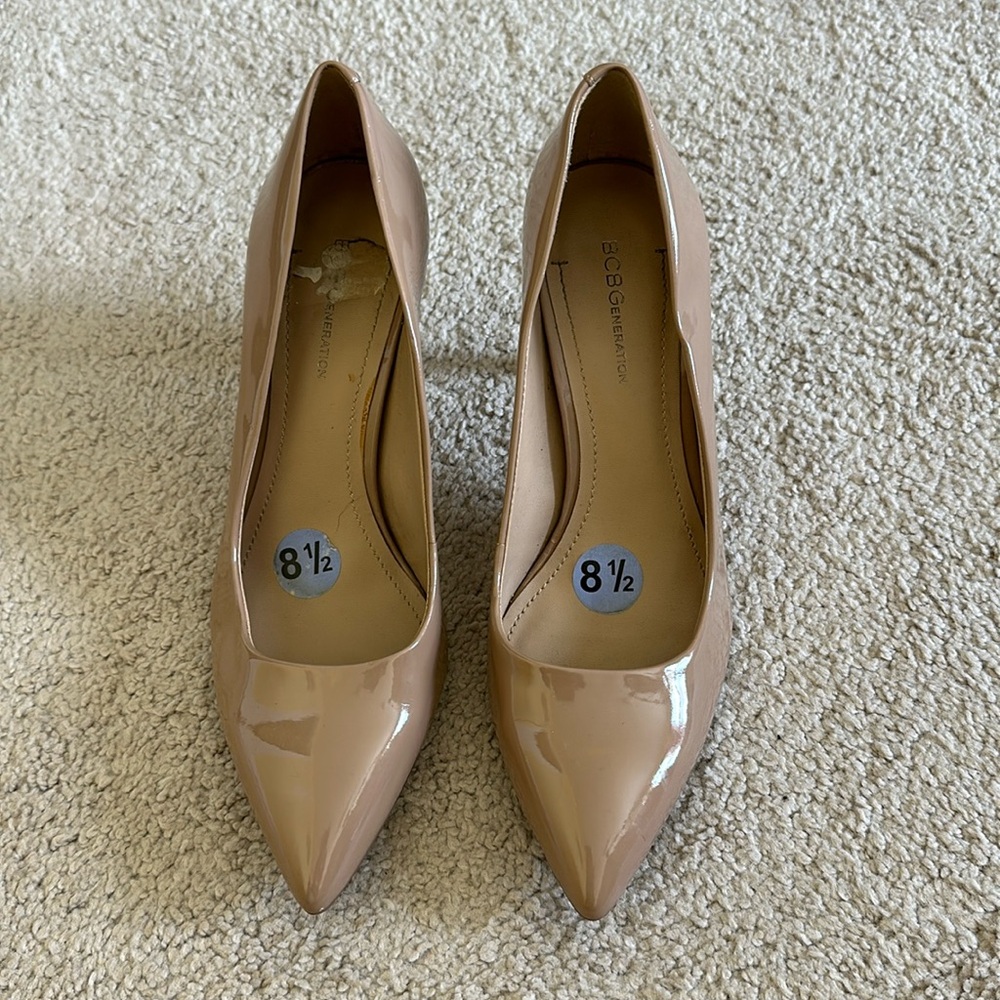 Tan heels. Size 8 1/2. Only worn twice. Patent leather.